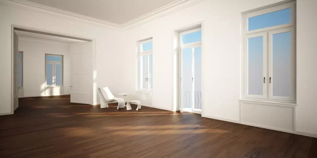 Wohnraum mit Holzboden und weißen Wänden